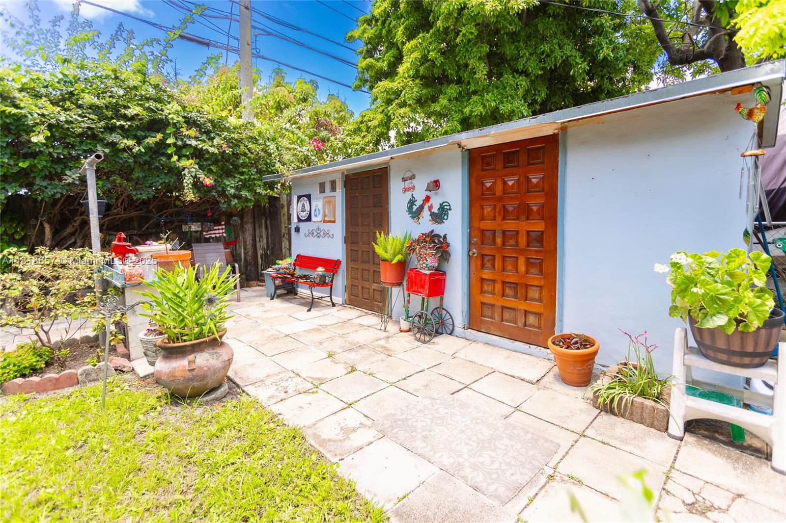 7110 Southwest 13th Terrace Miami, FL 33144 - Photo 43 of 48 a view of a chairs and table in a patio