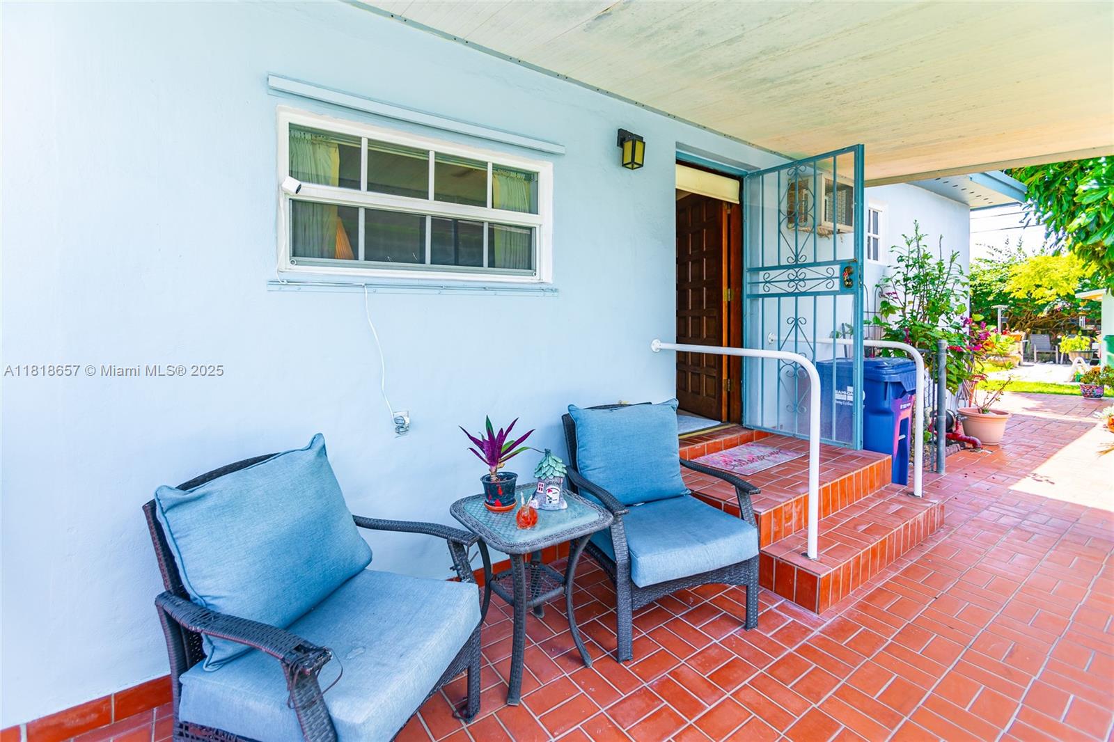 7110 Southwest 13th Terrace Miami, FL 33144 - Photo 8 of 48 a outdoor space with patio furniture