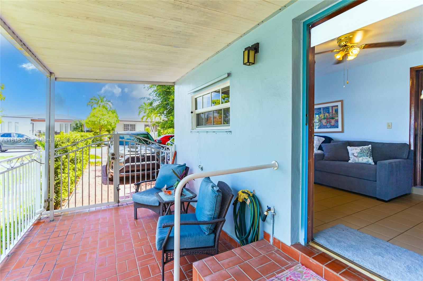 7110 Southwest 13th Terrace Miami, FL 33144 - Photo 9 of 48 a living room with furniture and a wooden floor