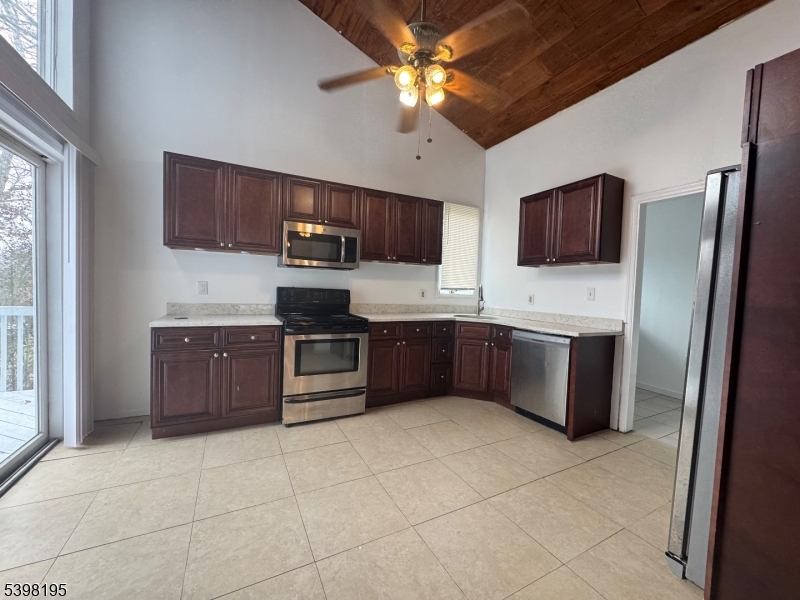 252 Wiscasset Road Vernon, NJ 07422 - Photo 5 of 10 a large kitchen with a cabinets and stainless steel appliances