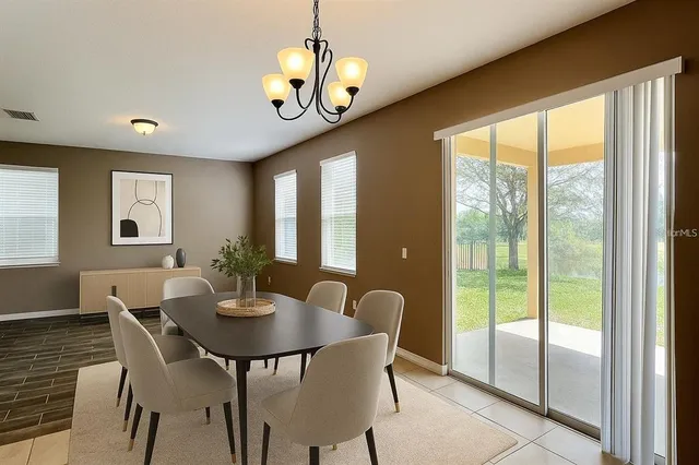 a bedroom with bed and a window