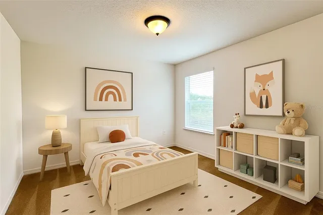 a view of a room with wooden floor chandelier and window