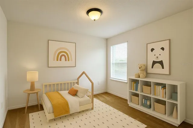 a kitchen with kitchen island granite countertop a sink and a stove