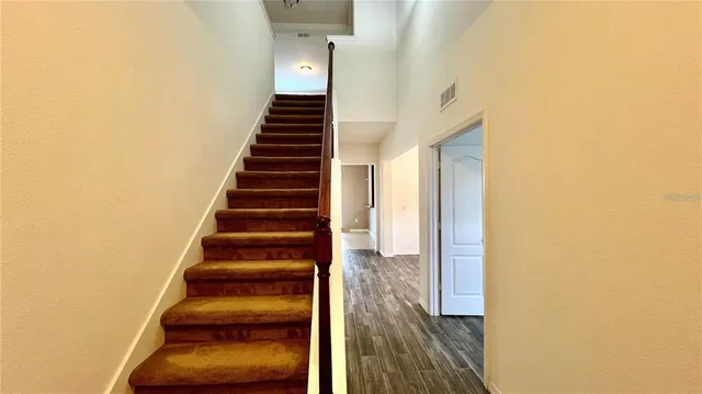 a workspace with furniture window and wooden floor