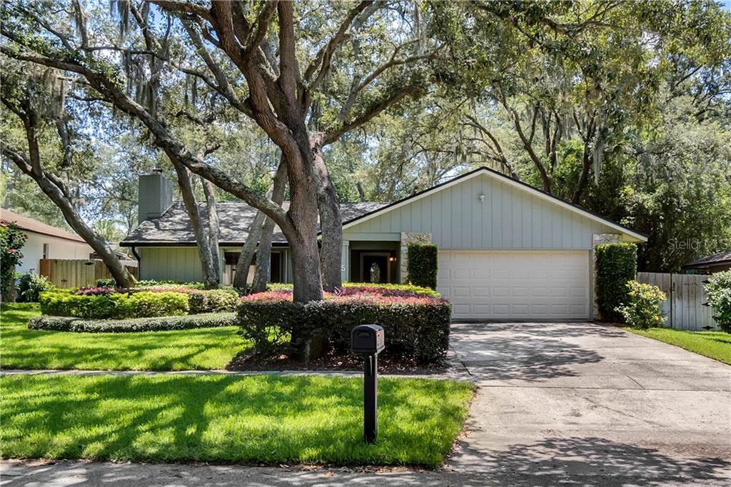 555 Heather Brite Circle Apopka, FL 32712 - Photo 1 of 1 a front view of house with yard and green space
