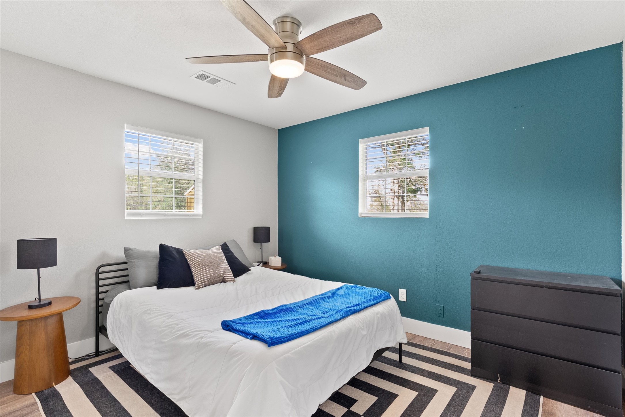 274 Old Austin Trail Elgin, TX 78621 - Photo 17 of 32 a bedroom with a large bed and a window