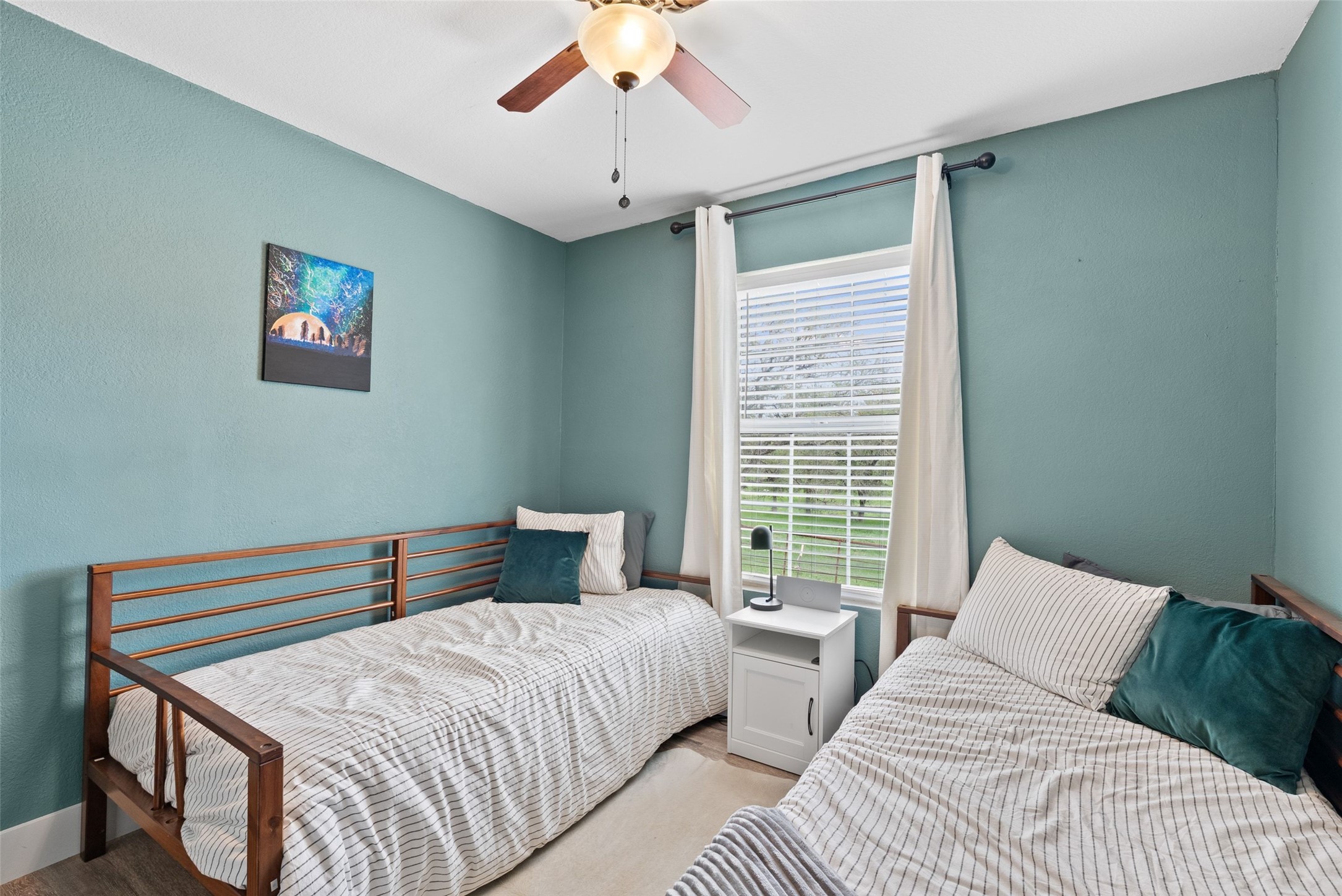 274 Old Austin Trail Elgin, TX 78621 - Photo 19 of 32 a bedroom with a bed and a window