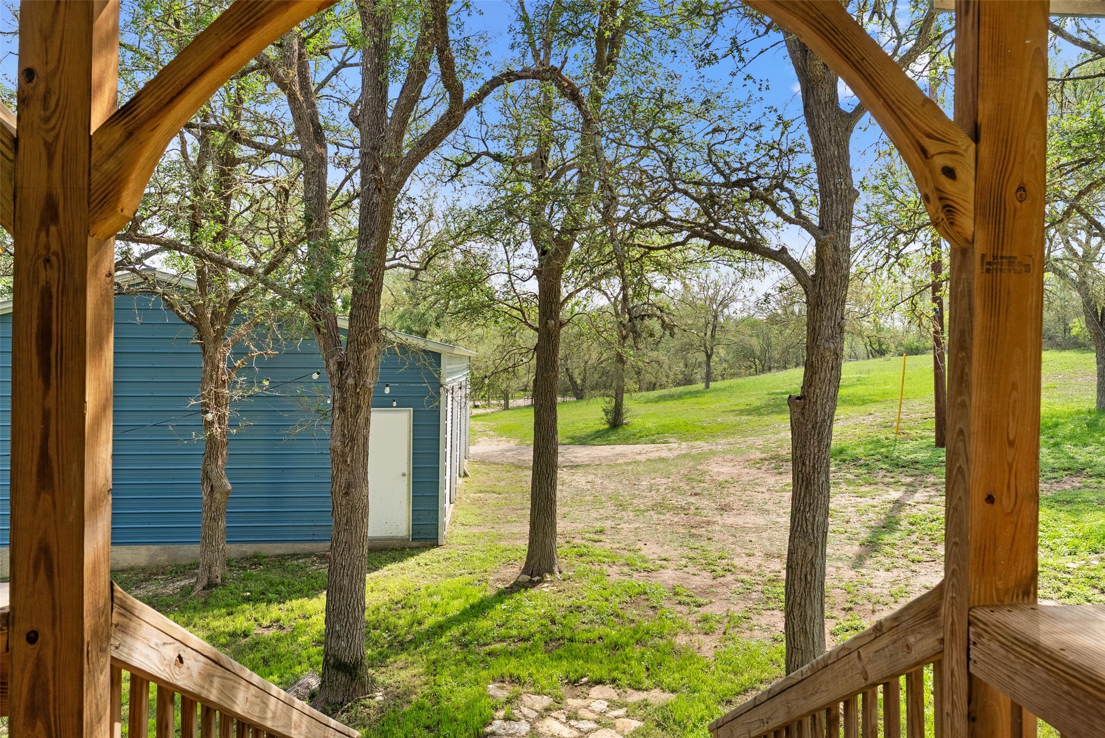 274 Old Austin Trail Elgin, TX 78621 - Photo 23 of 32 a view of backyard with large trees