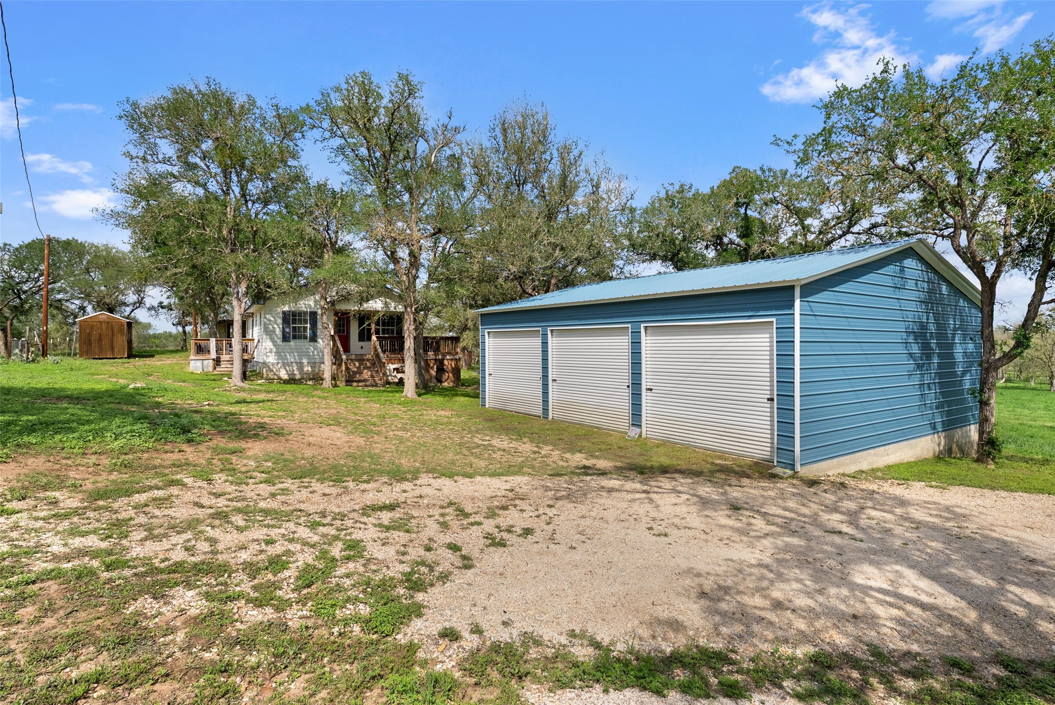 274 Old Austin Trail Elgin, TX 78621 - Photo 24 of 32 a view of a house with a yard
