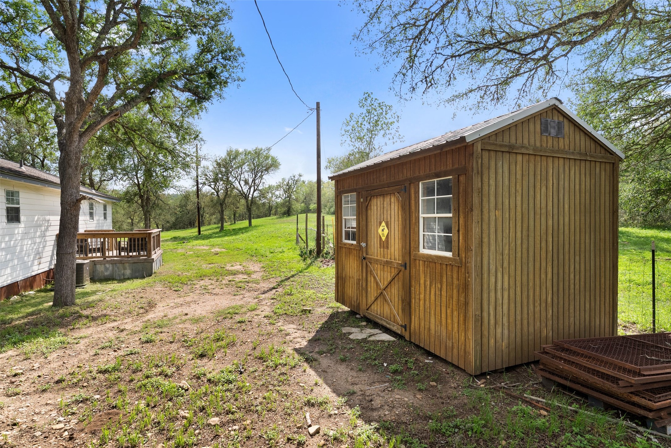 274 Old Austin Trail Elgin, TX 78621 - Photo 26 of 32 a view of a house with a yard
