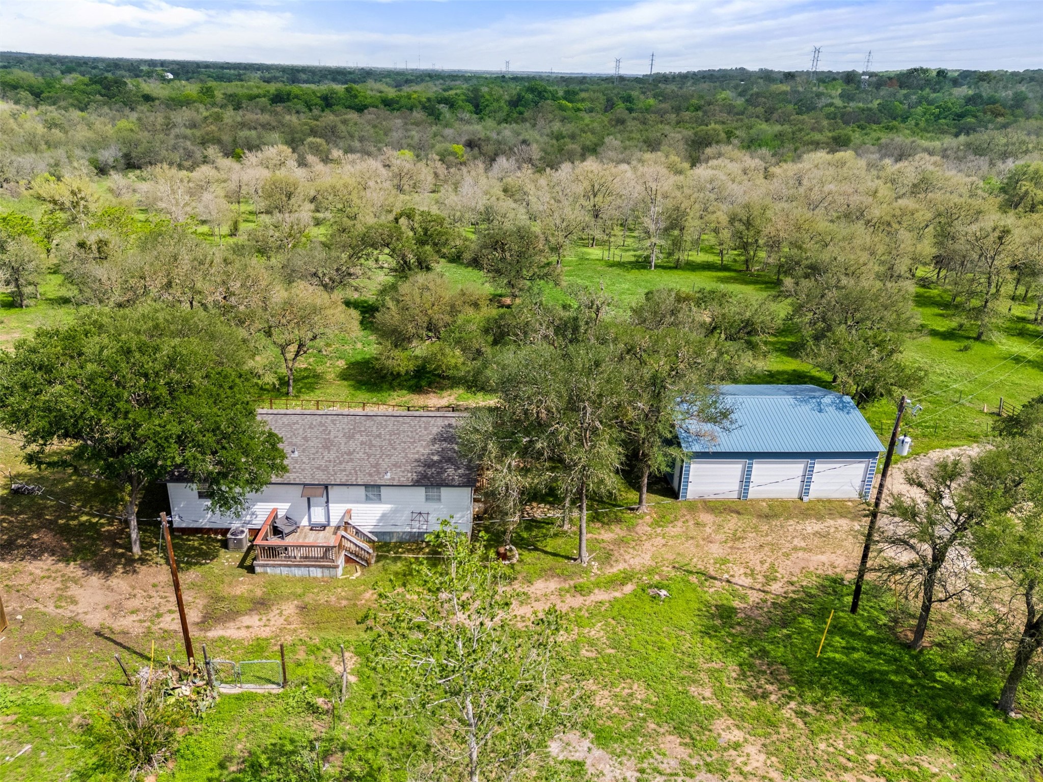274 Old Austin Trail Elgin, TX 78621 - Photo 32 of 32 a backyard of a house with yard and outdoor seating