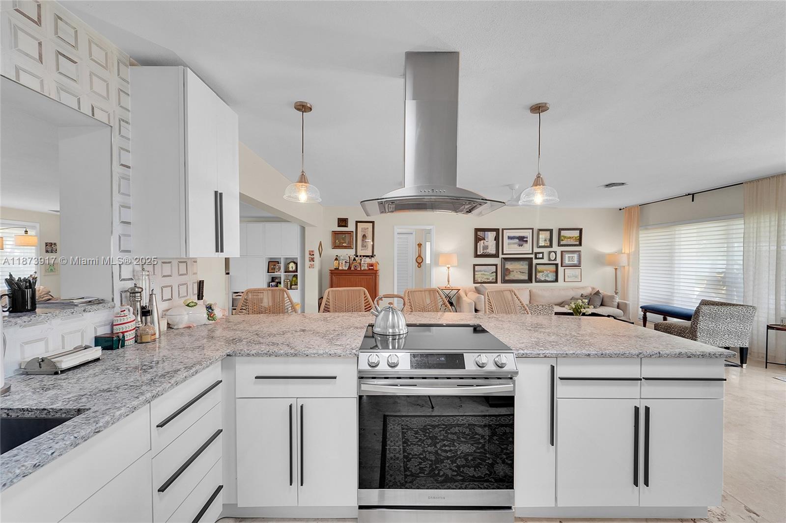 1431 South Ocean Boulevard, Unit 11 Lauderdale-by-the-Sea, FL 33062 - Photo 11 of 42 a kitchen with stainless steel appliances granite countertop a stove a sink and a refrigerator