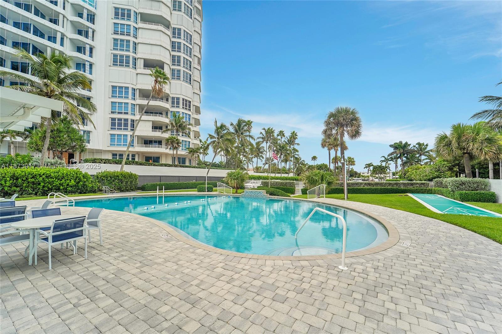 1431 South Ocean Boulevard, Unit 11 Lauderdale-by-the-Sea, FL 33062 - Photo 29 of 42 a view of pool with outdoor seating