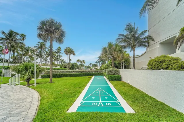 a view of swimming pool with a yard