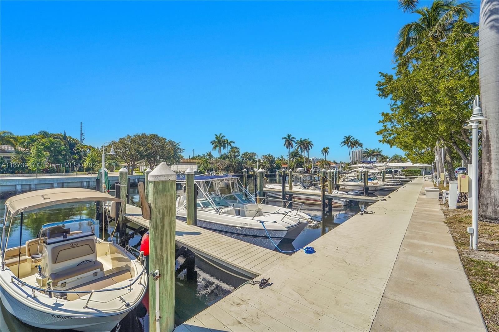 1431 South Ocean Boulevard, Unit 11 Lauderdale-by-the-Sea, FL 33062 - Photo 35 of 42 a view of a chairs and table in the balcony