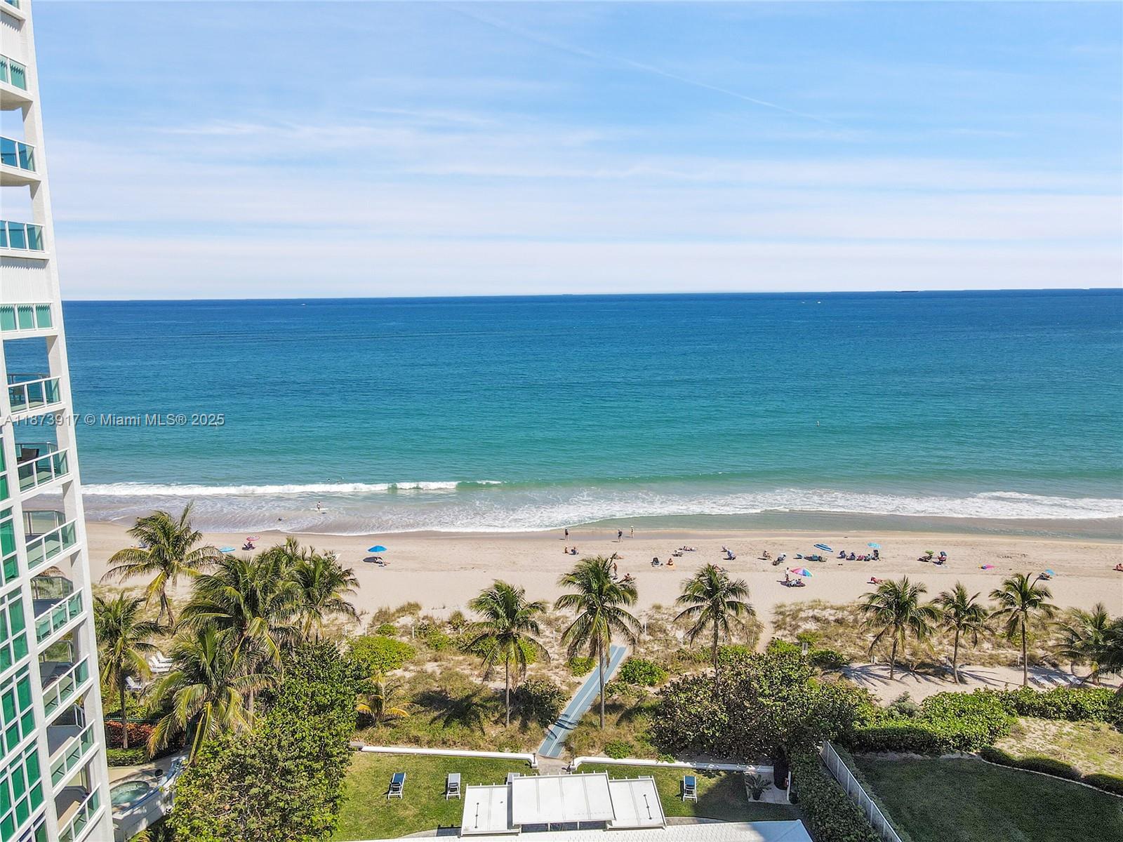 1431 South Ocean Boulevard, Unit 11 Lauderdale-by-the-Sea, FL 33062 - Photo 41 of 42 a view of a large body of water with a building in the background