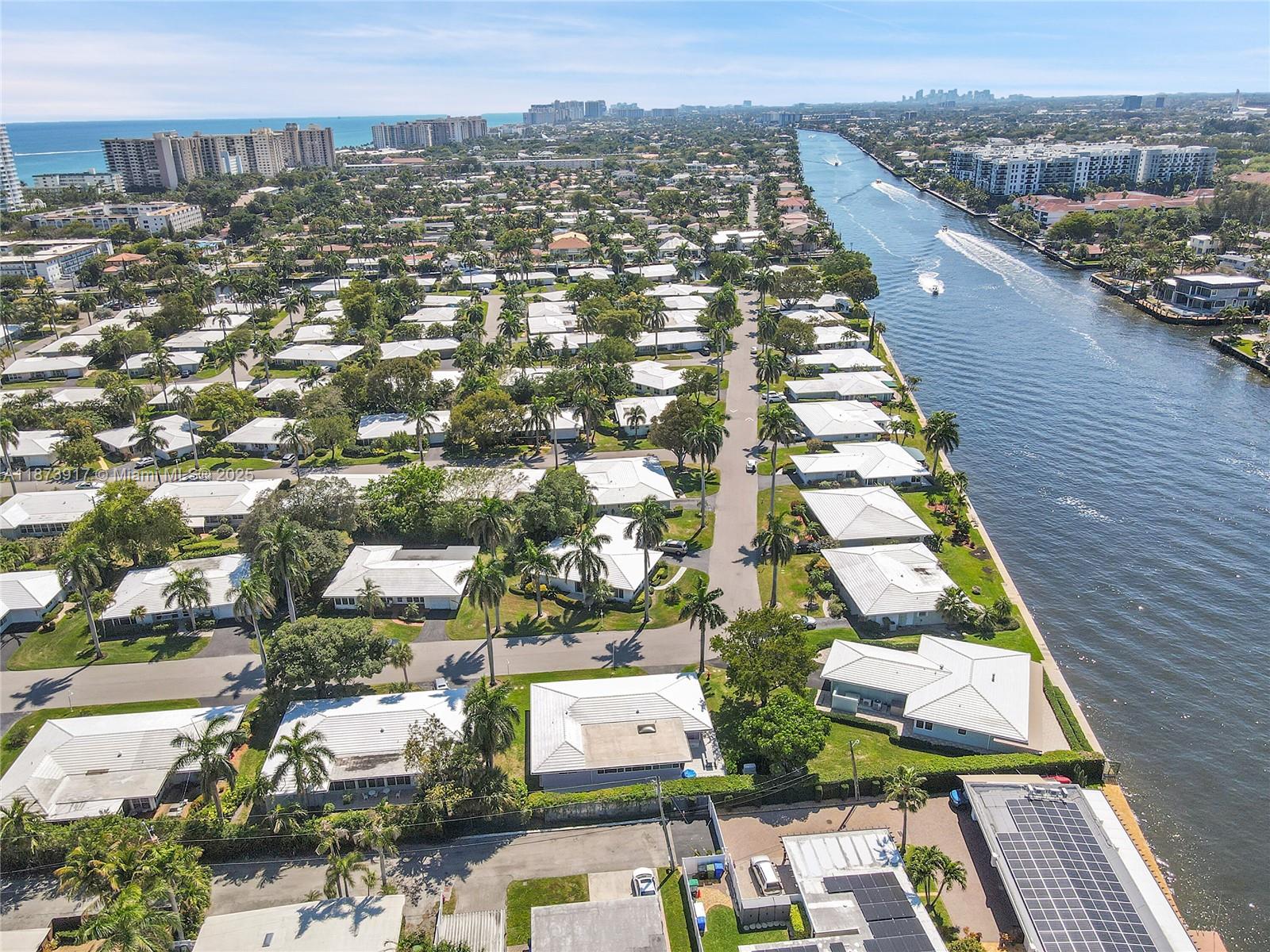 1431 South Ocean Boulevard, Unit 11 Lauderdale-by-the-Sea, FL 33062 - Photo 42 of 42 an aerial view of a residential houses with city view