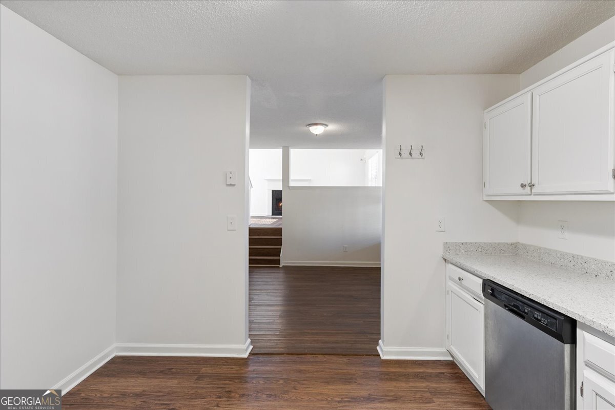 7132 New Dale Road Rex, GA 30273 - Photo 14 of 31 a view of a kitchen with a sink and dishwasher oven window