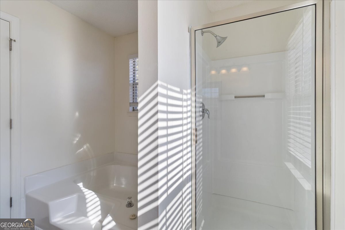 7132 New Dale Road Rex, GA 30273 - Photo 20 of 31 a bathroom with a shower