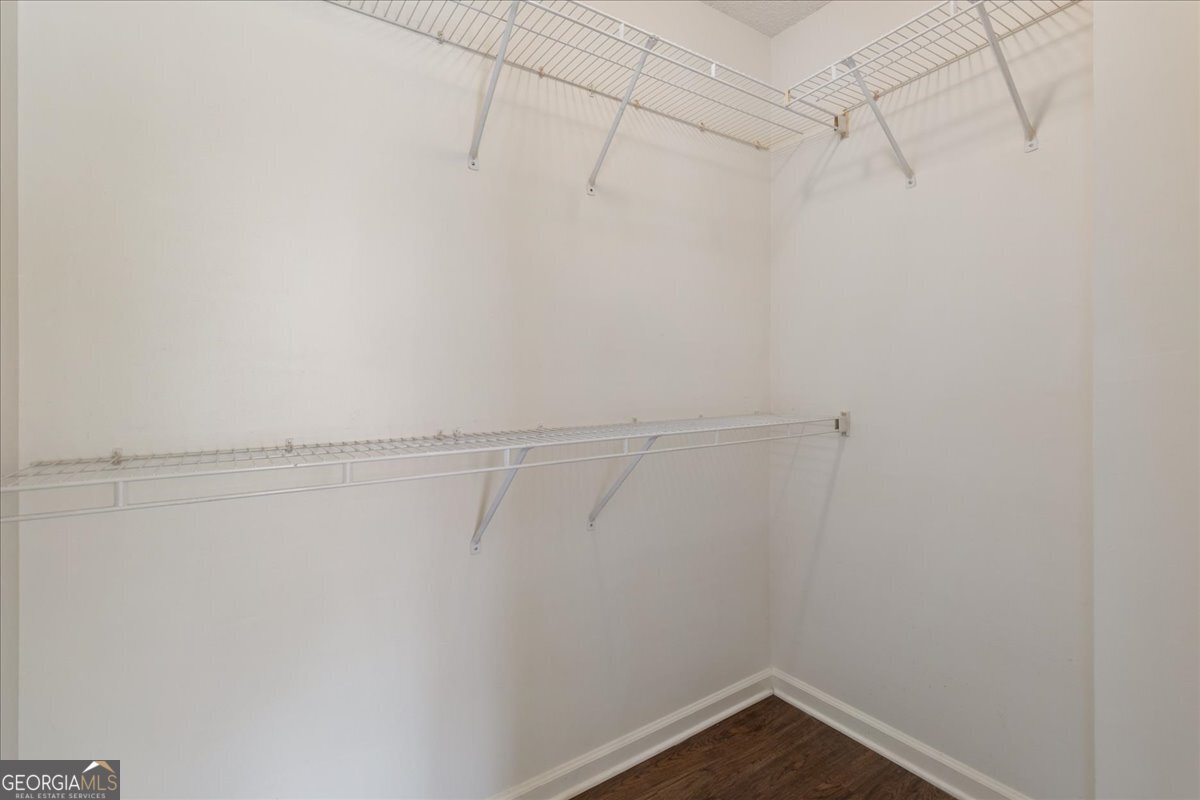 7132 New Dale Road Rex, GA 30273 - Photo 22 of 31 a view of a room with racks on the wall