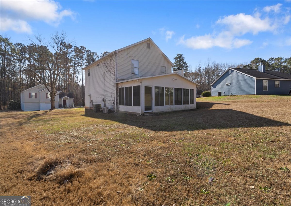 7132 New Dale Road Rex, GA 30273 - Photo 28 of 31 a front view of a house with a yard
