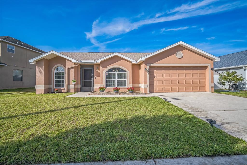 10841 Standing Stone Drive Wimauma, FL 33598 - Photo 1 of 1 front view of a house with a yard