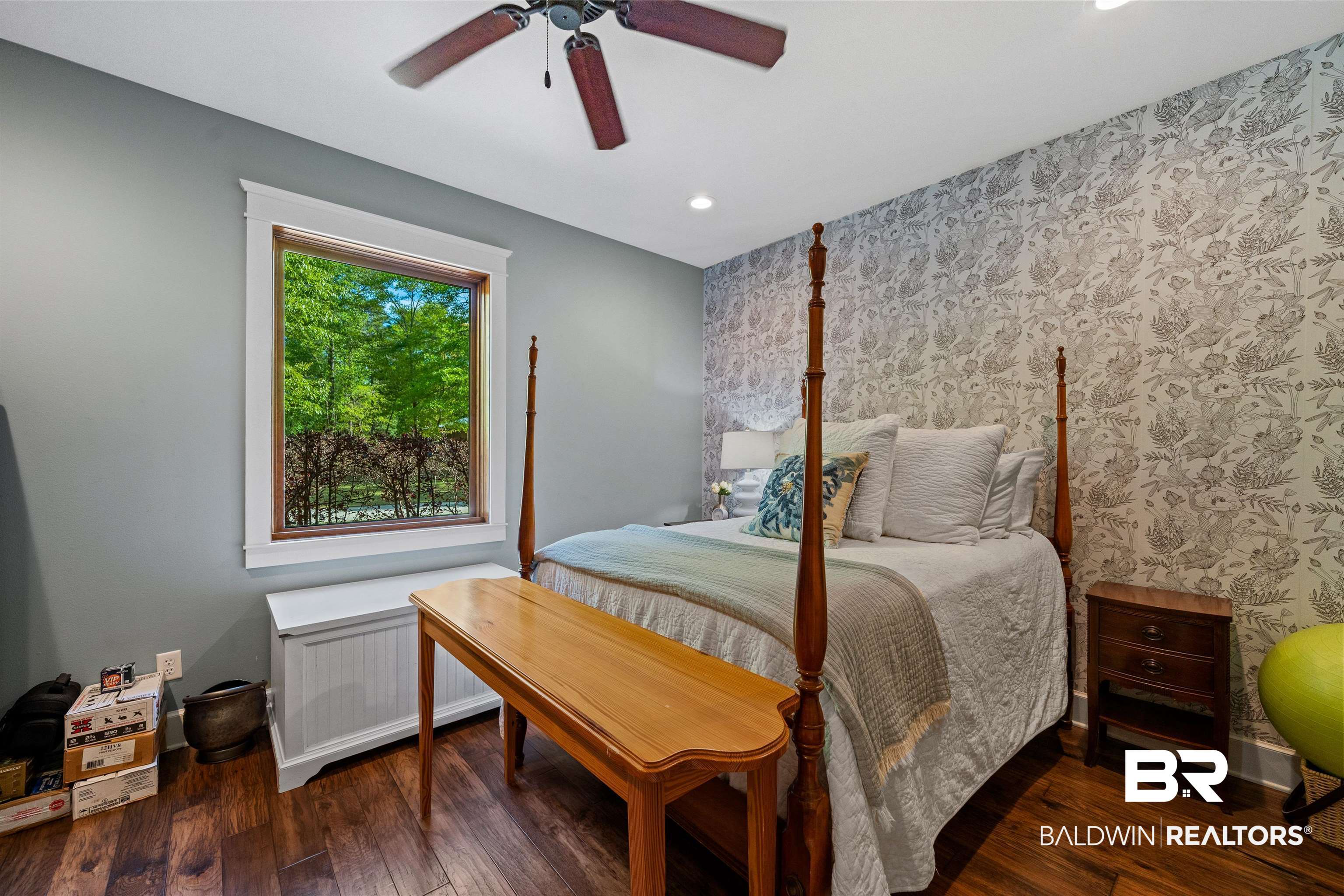 47252 Emmons Road Bay Minette, AL 36507 - Photo 32 of 50 Bedroom featuring dark wood-style floors, wallpapered walls, an accent wall, a ceiling fan, and recessed lighting