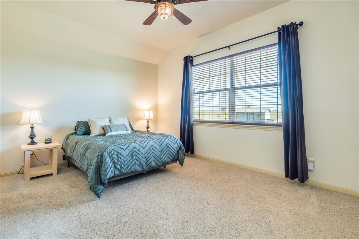 909 County Road 342 Granger, TX 76530 - Photo 18 of 37 Spacious primary bedroom with ensuite bath