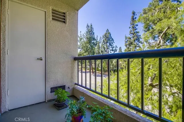 a view of a balcony with a swing
