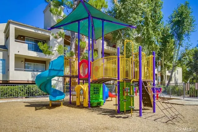 a view of outdoor space with a table and chairs