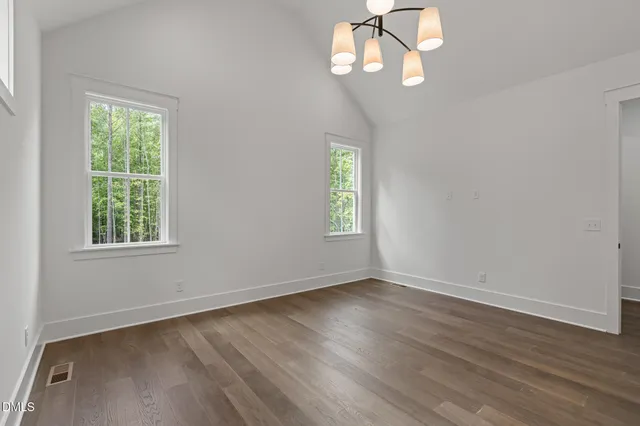a spacious bathroom with a bathtub and a sink
