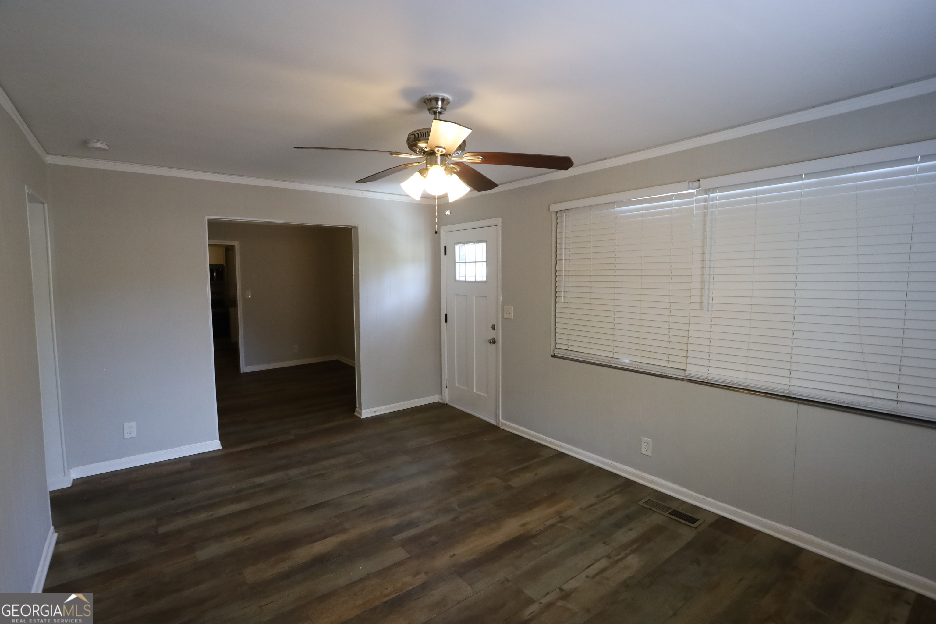 2096 Dellwood Place Decatur, GA 30032 - Photo 2 of 8 wooden floor in an empty room with a window