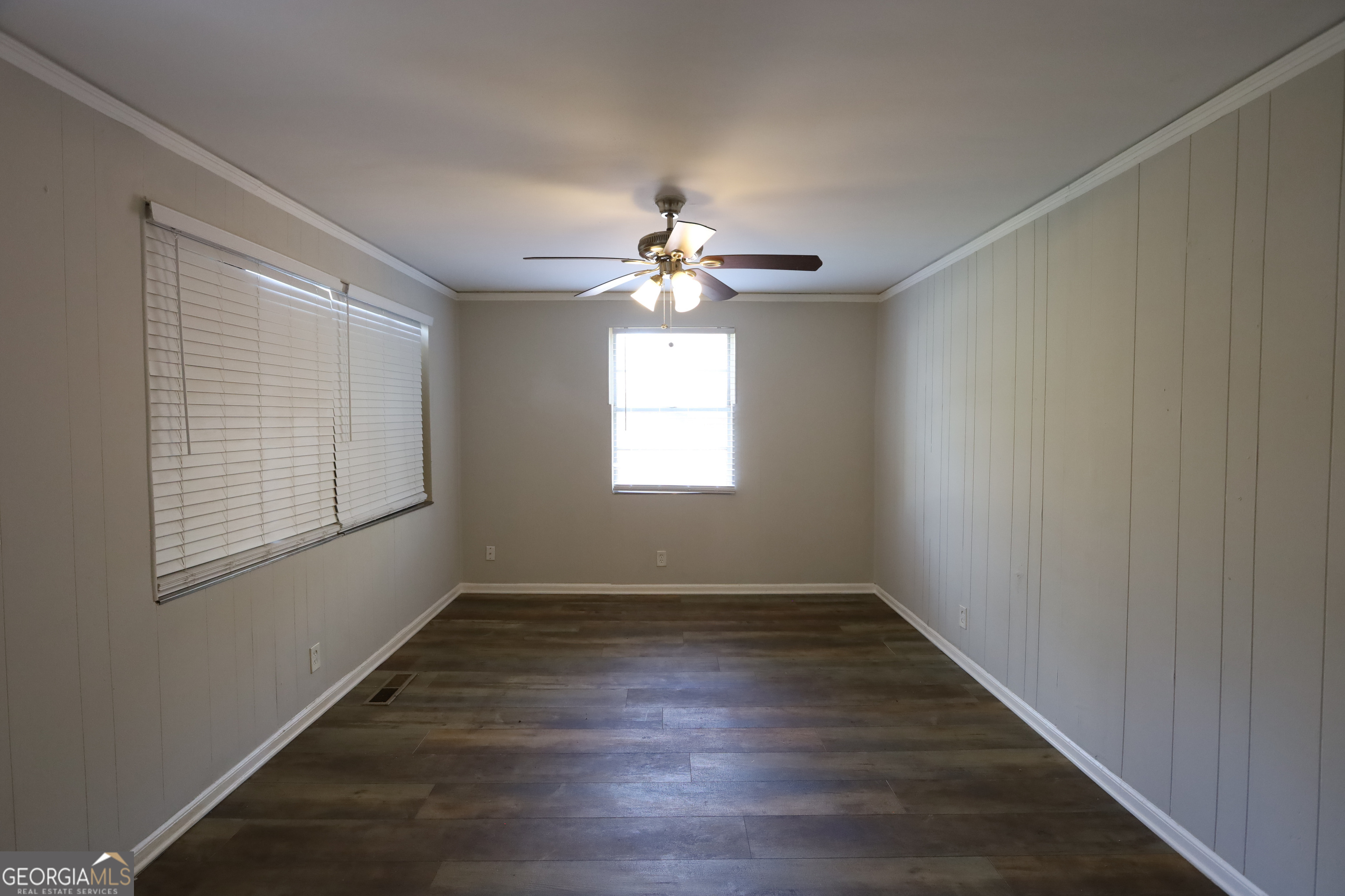 2096 Dellwood Place Decatur, GA 30032 - Photo 3 of 8 an empty room with wooden floor and windows
