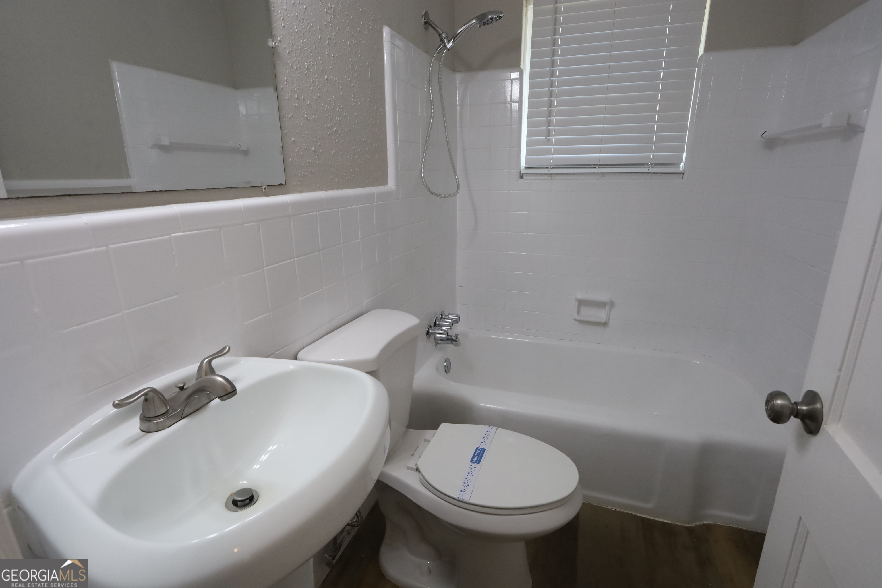 2096 Dellwood Place Decatur, GA 30032 - Photo 4 of 8 a bathroom with a sink and a toilet