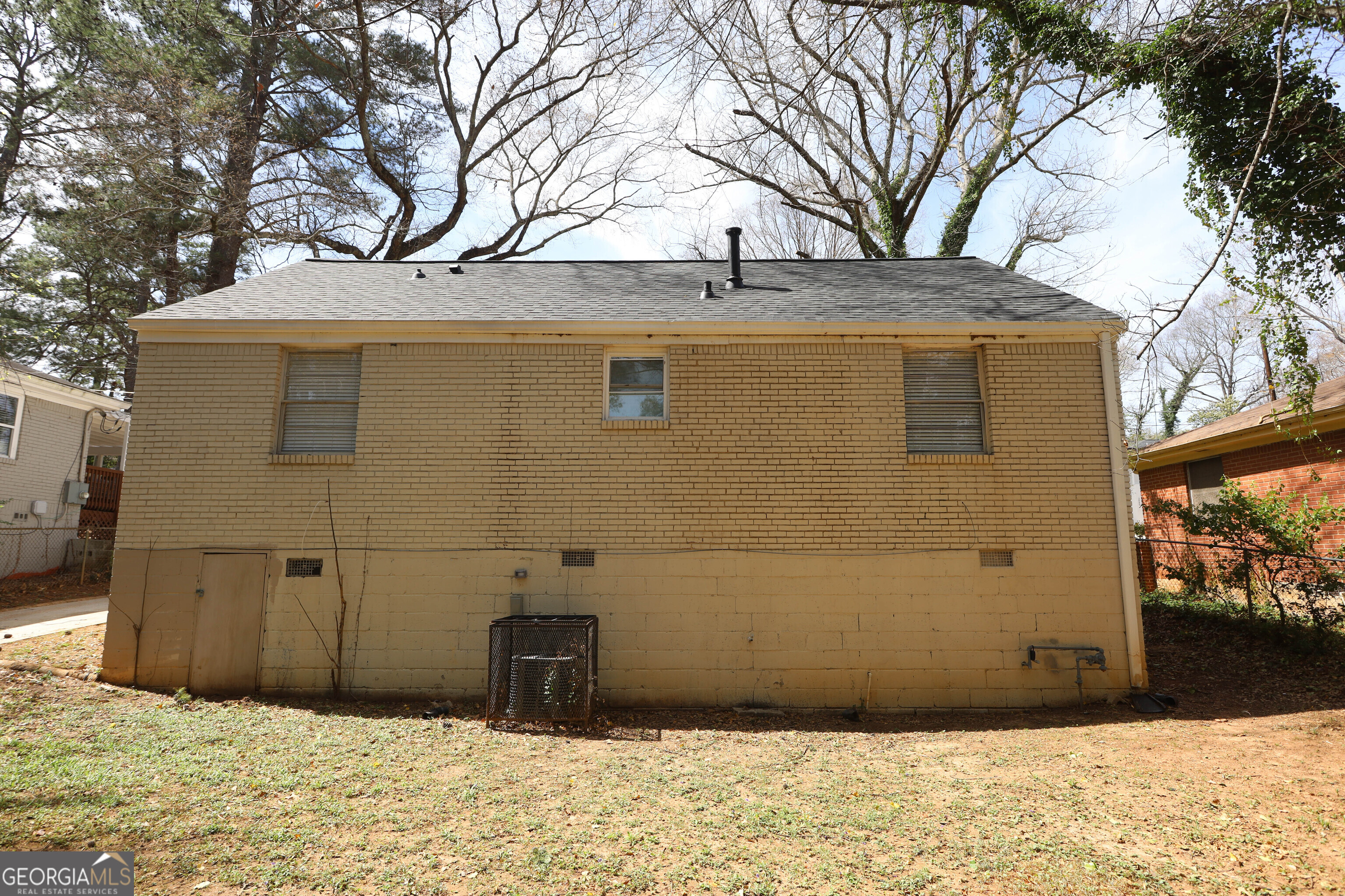 2096 Dellwood Place Decatur, GA 30032 - Photo 8 of 8 a view of a house with a large tree