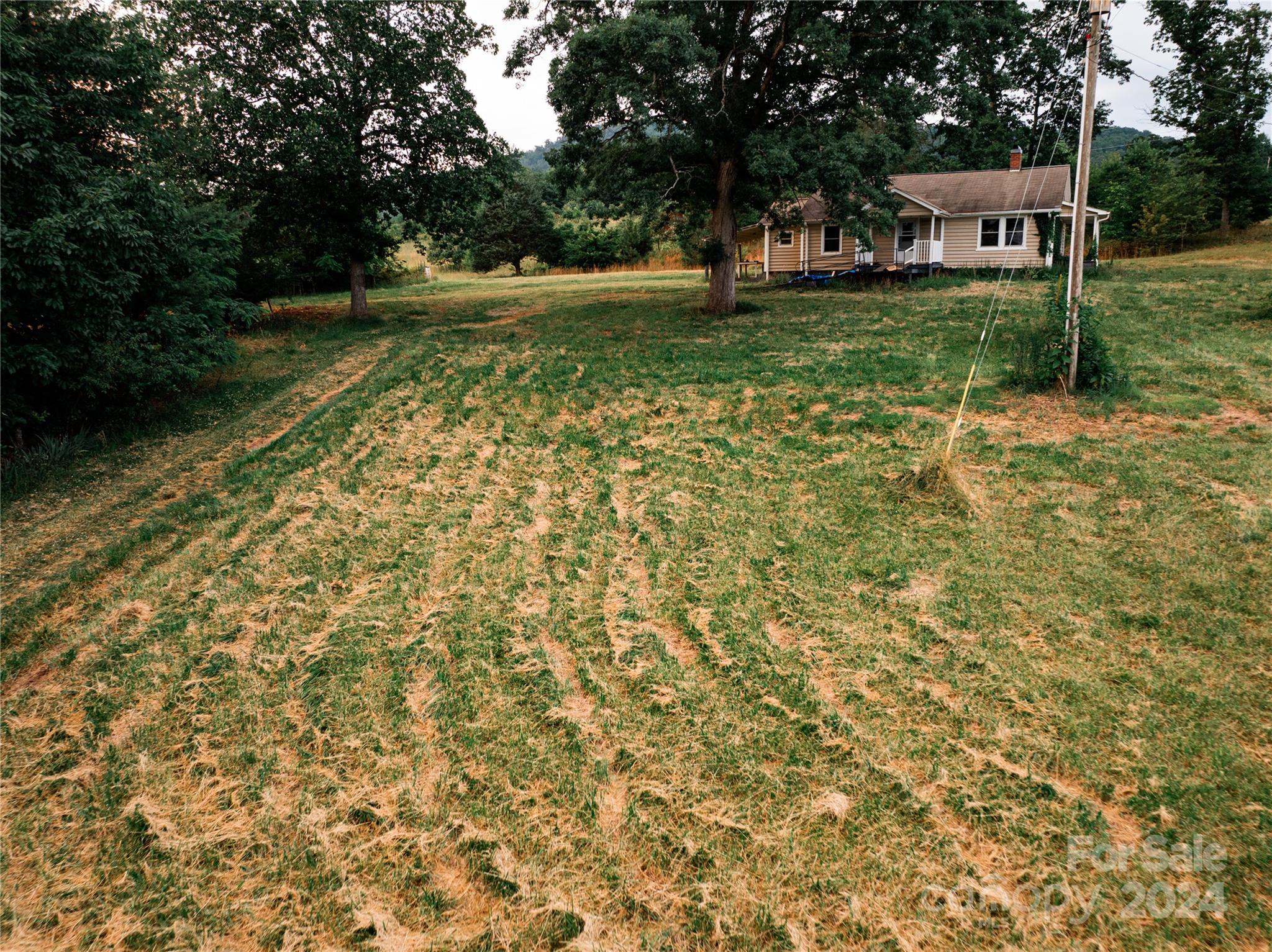 931 Waters Road Bostic, NC 28018 - Photo 11 of 22 a view of a house with a yard