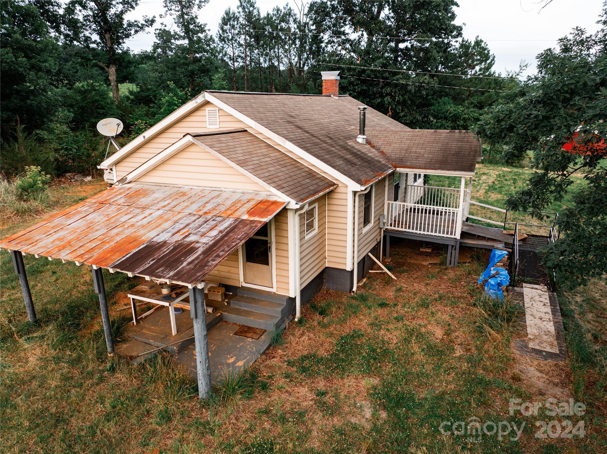 931 Waters Road Bostic, NC 28018 - Photo 12 of 22 a aerial view of a house with a yard and sitting area