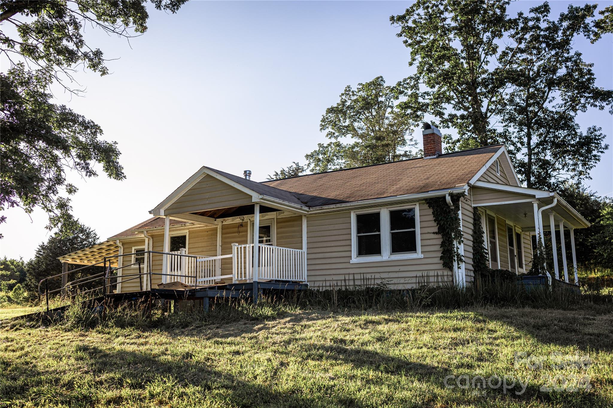 931 Waters Road Bostic, NC 28018 - Photo 22 of 22 a front view of a house with a yard