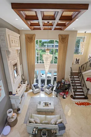 a view of a backyard with sitting area