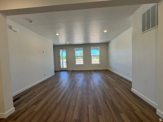 1476 North 1875 West, Unit 152 Layton, UT 84041 - Photo 9 of 20 Spacious interior featuring wood-finish flooring, recessed lighting, and white baseboards