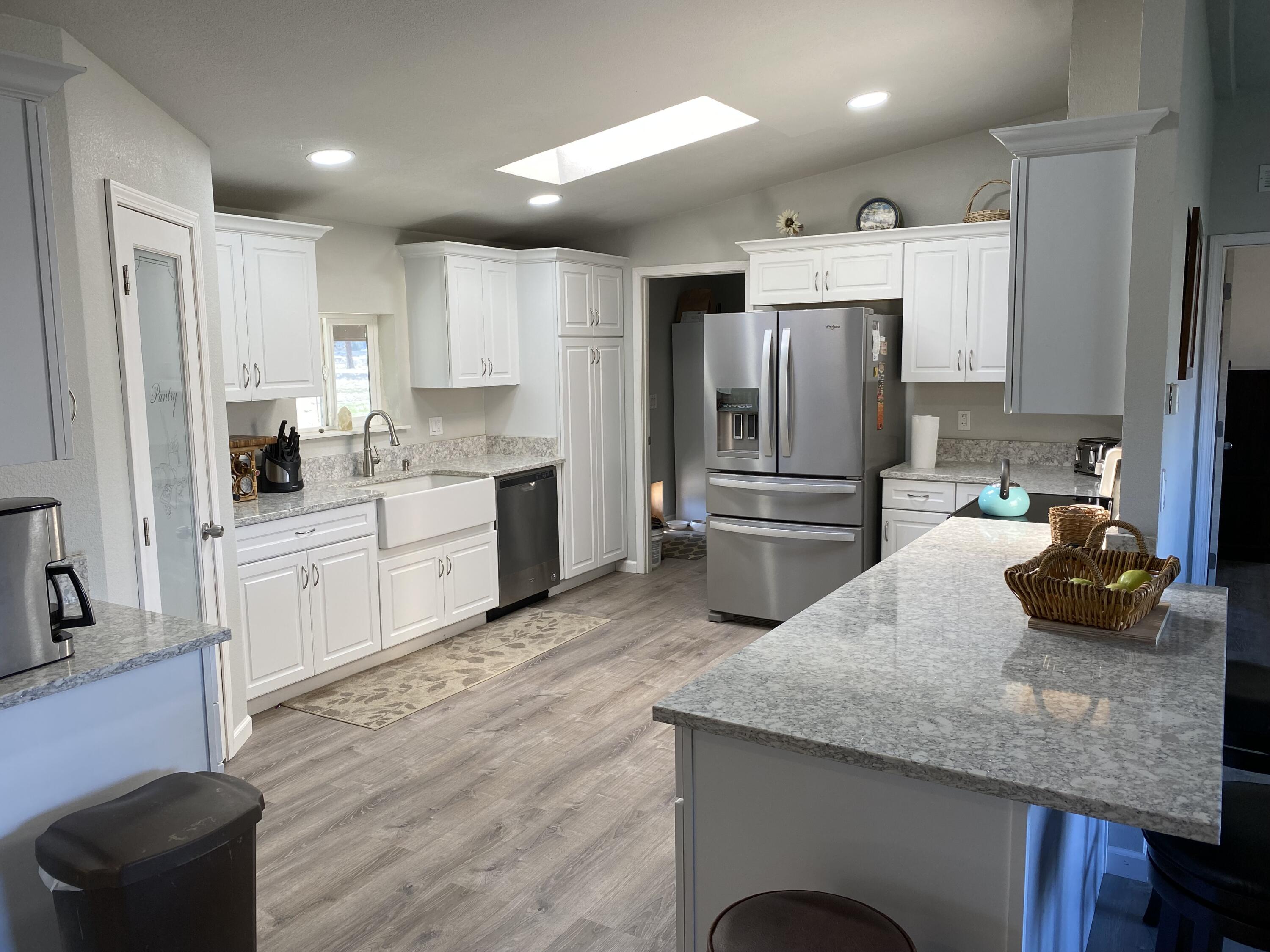 32227 Rivers Drive Chiloquin, OR 97624 - Photo 11 of 55 Beautiful NEW kitchen, new appliances, new quartz counters, new cabinets (soft close), farm style sink, skylight