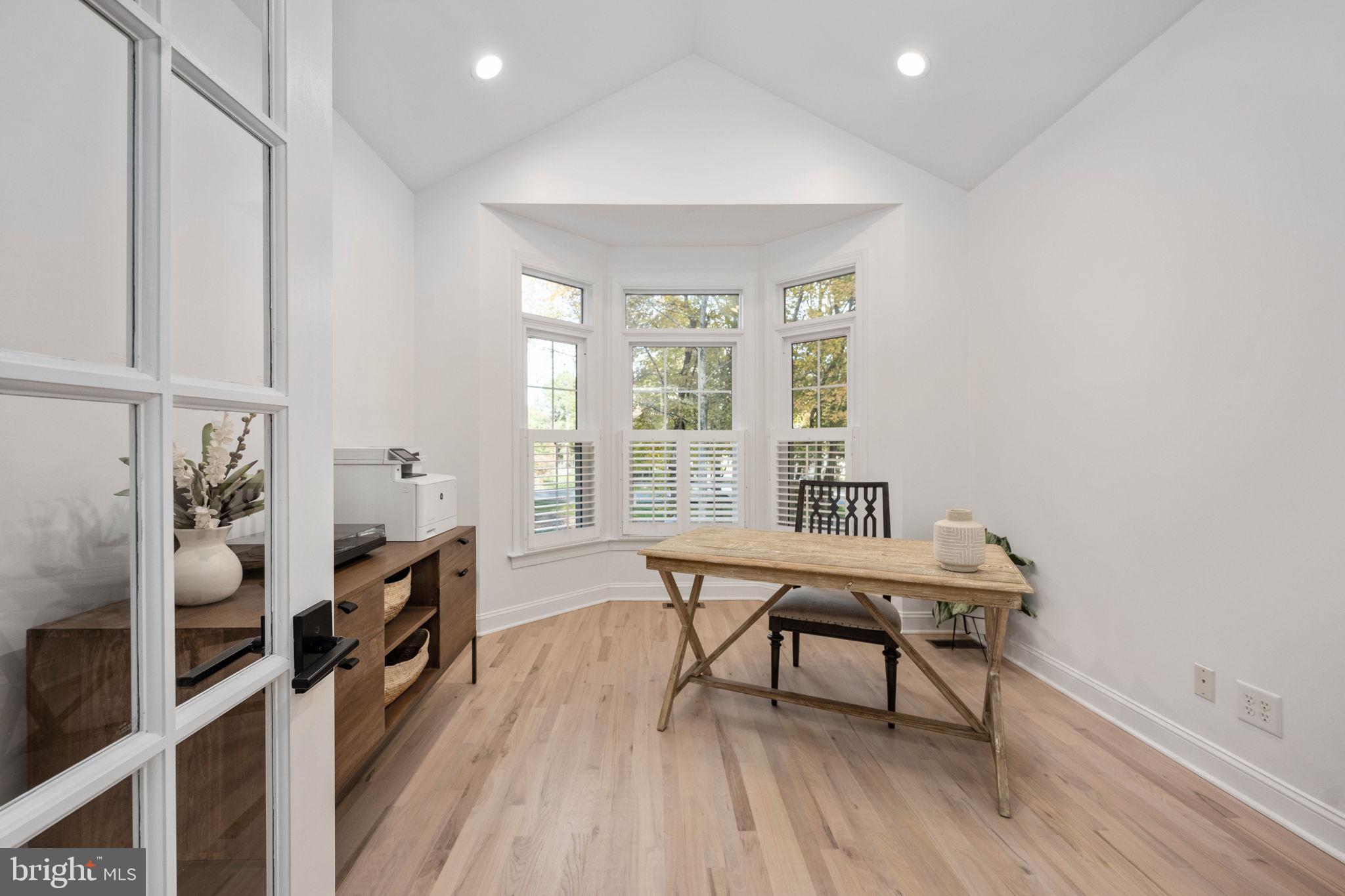 10816 Chatham Ridge Way Spotsylvania, VA 22551 - Photo 13 of 101 a view of a workspace with furniture and a window