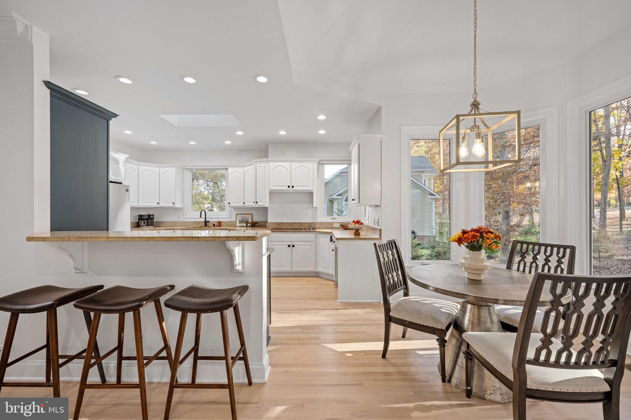 10816 Chatham Ridge Way Spotsylvania, VA 22551 - Photo 18 of 101 a dining room with furniture and window