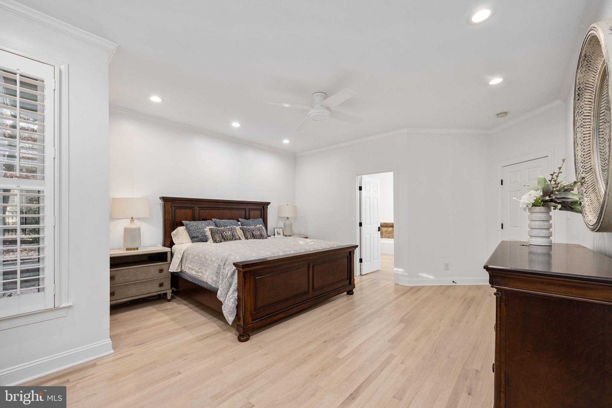 10816 Chatham Ridge Way Spotsylvania, VA 22551 - Photo 29 of 101 a bed room with a bed and a potted plant