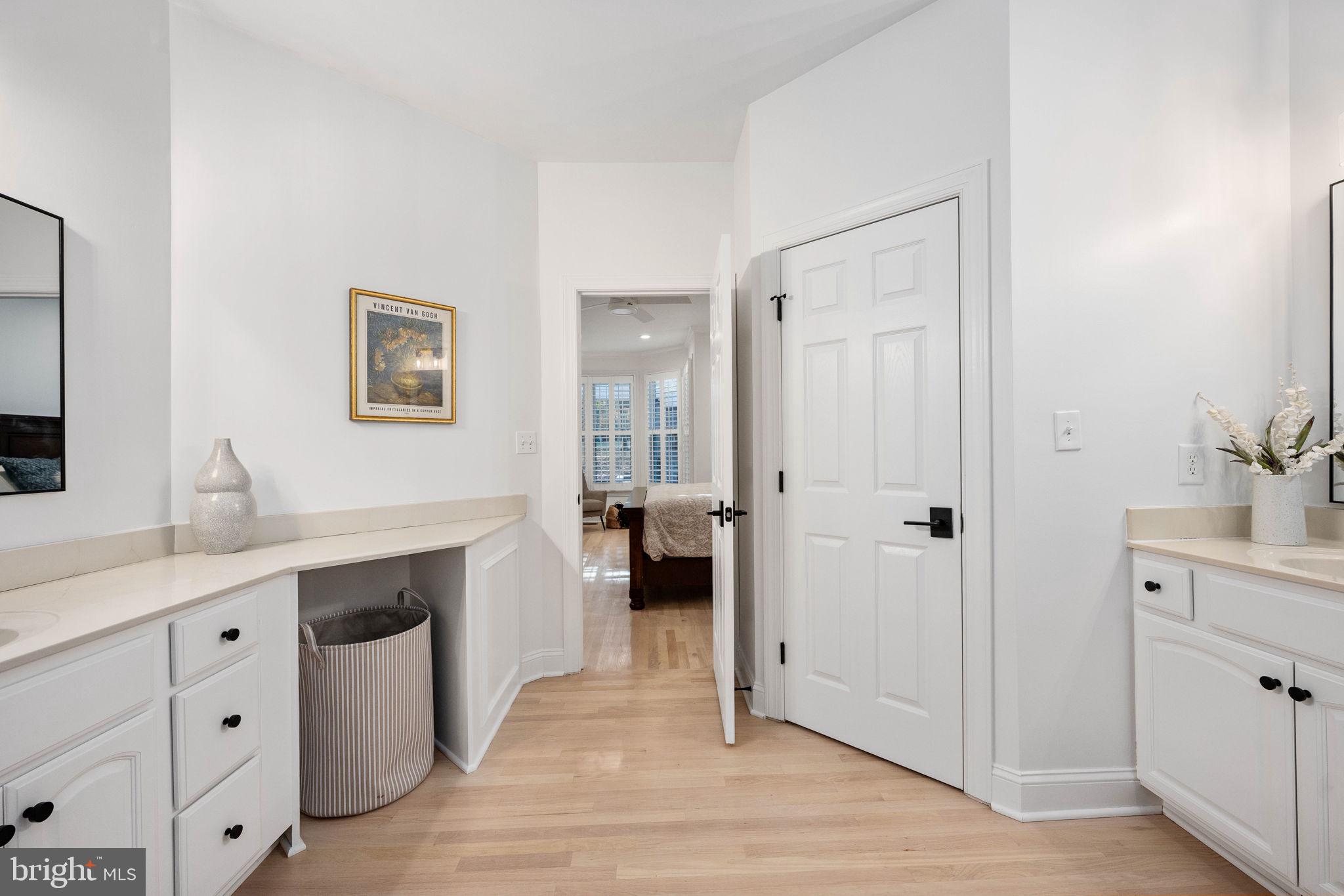10816 Chatham Ridge Way Spotsylvania, VA 22551 - Photo 37 of 101 a spacious bathroom with a double vanity sink a mirror and a shower