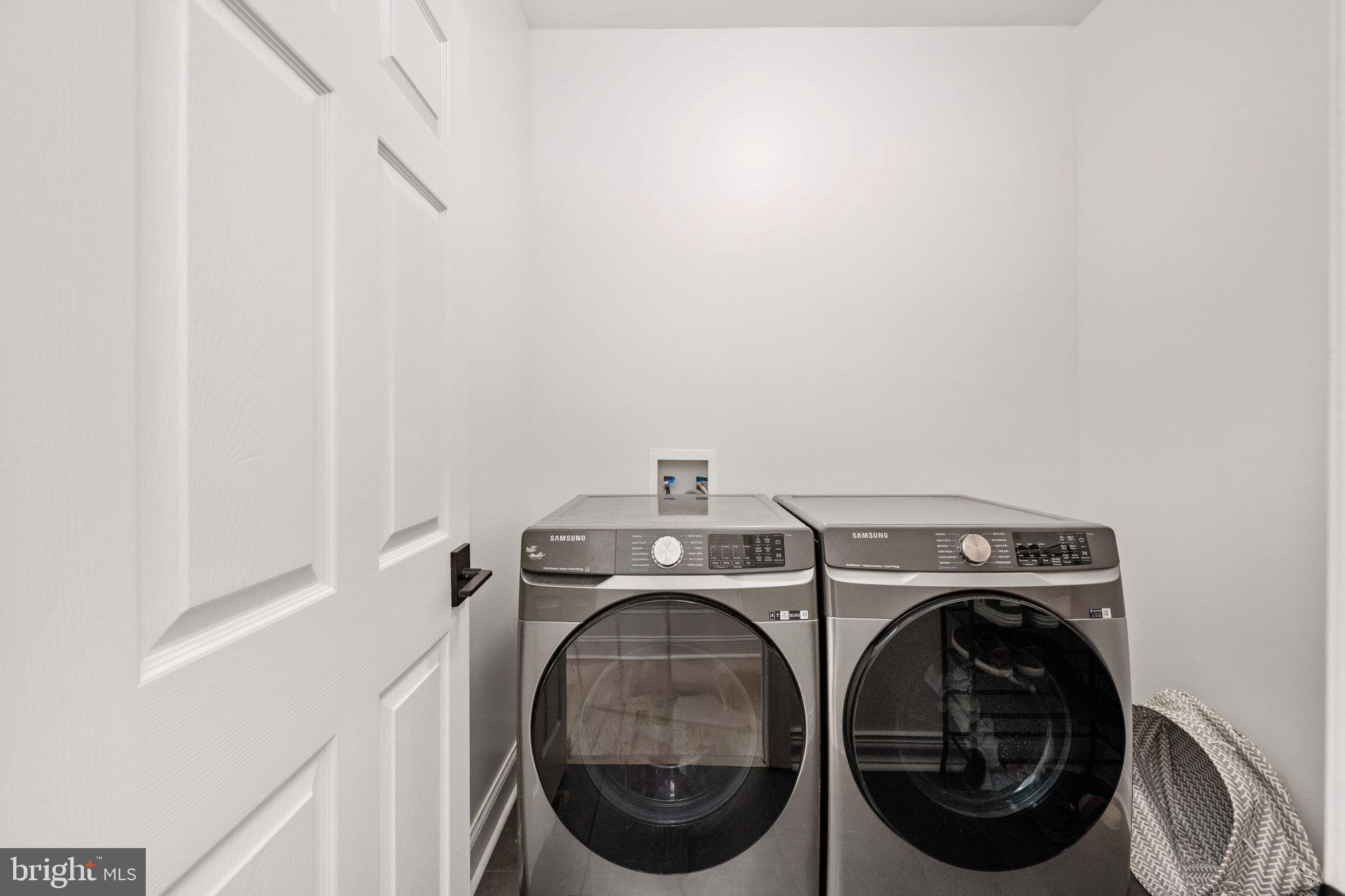 10816 Chatham Ridge Way Spotsylvania, VA 22551 - Photo 39 of 101 a utility room with dryer and washer