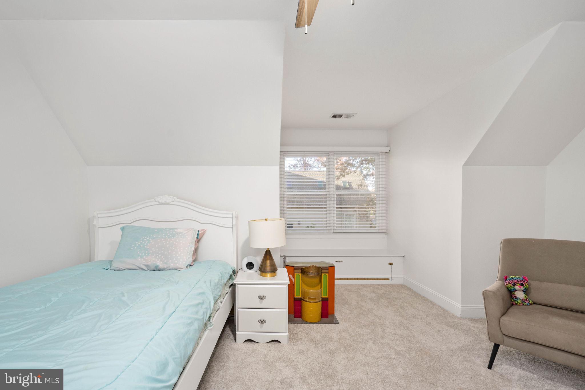 10816 Chatham Ridge Way Spotsylvania, VA 22551 - Photo 49 of 101 a bedroom with a bed and window