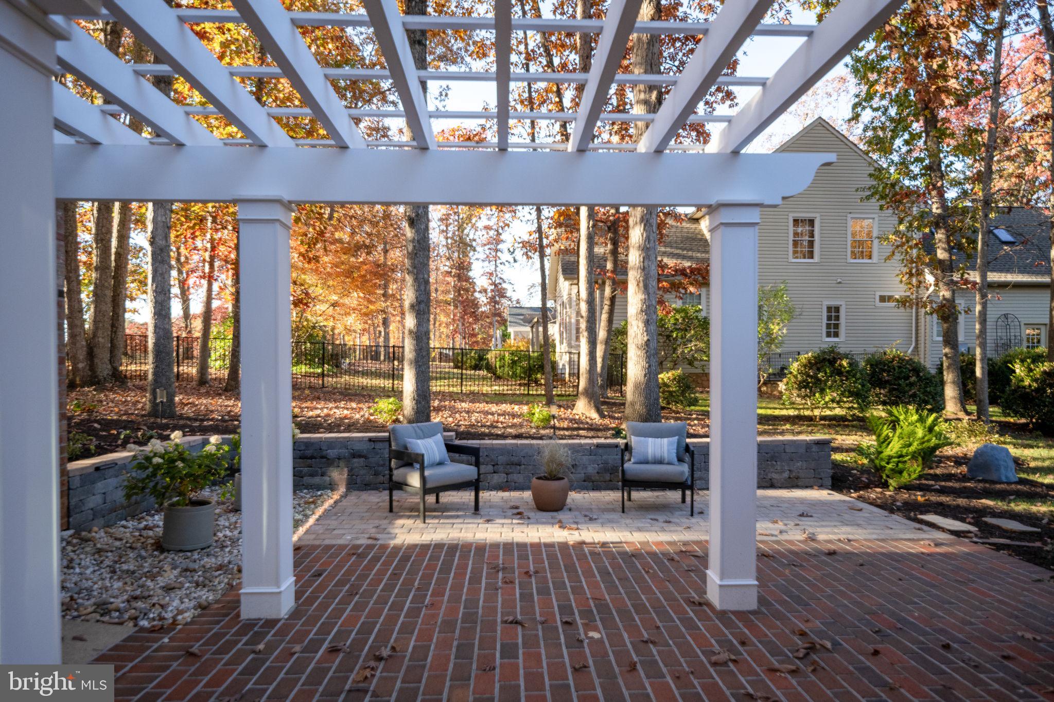 10816 Chatham Ridge Way Spotsylvania, VA 22551 - Photo 62 of 101 a living room with furniture and wooden floor