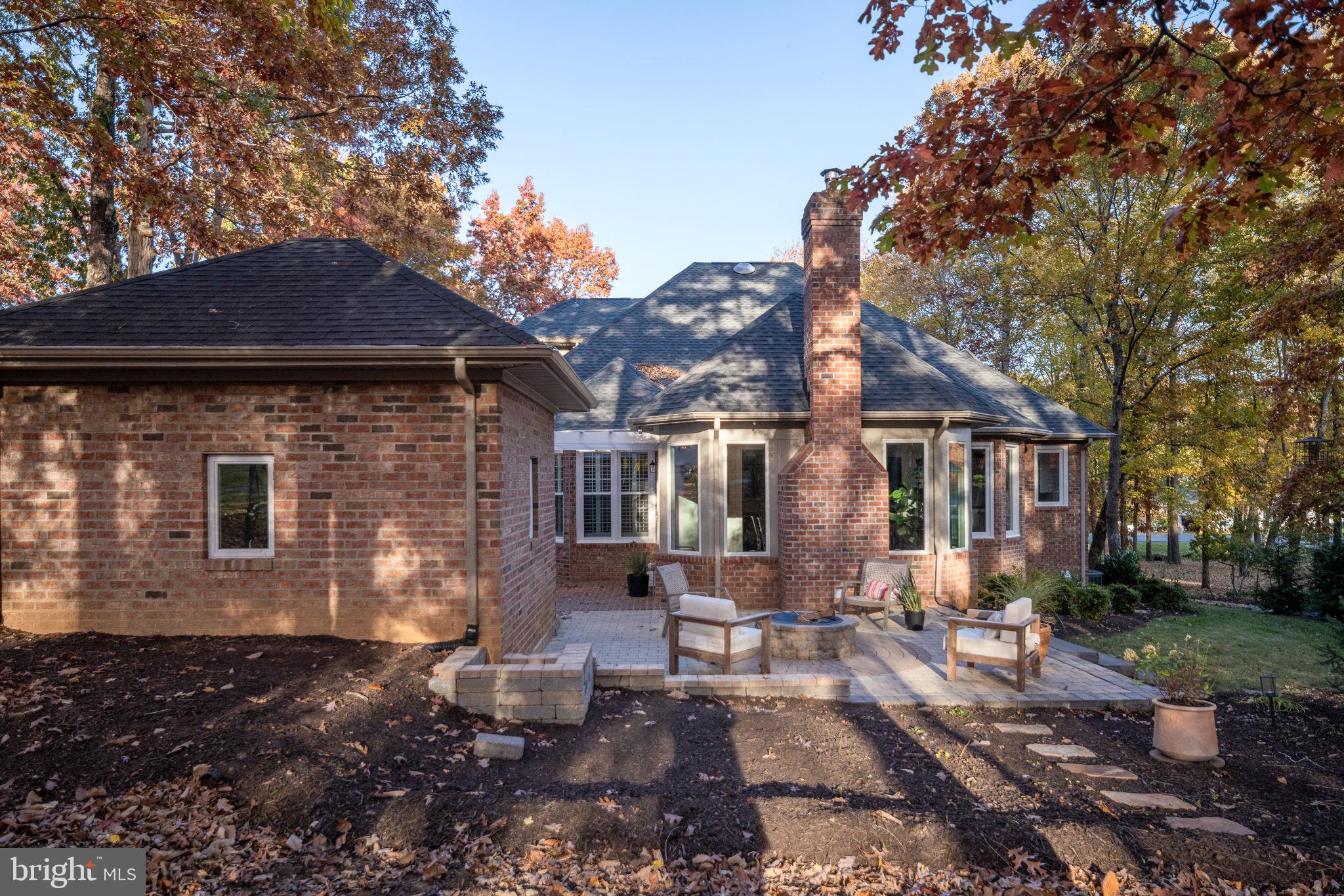 10816 Chatham Ridge Way Spotsylvania, VA 22551 - Photo 69 of 101 a front view of a house with a yard