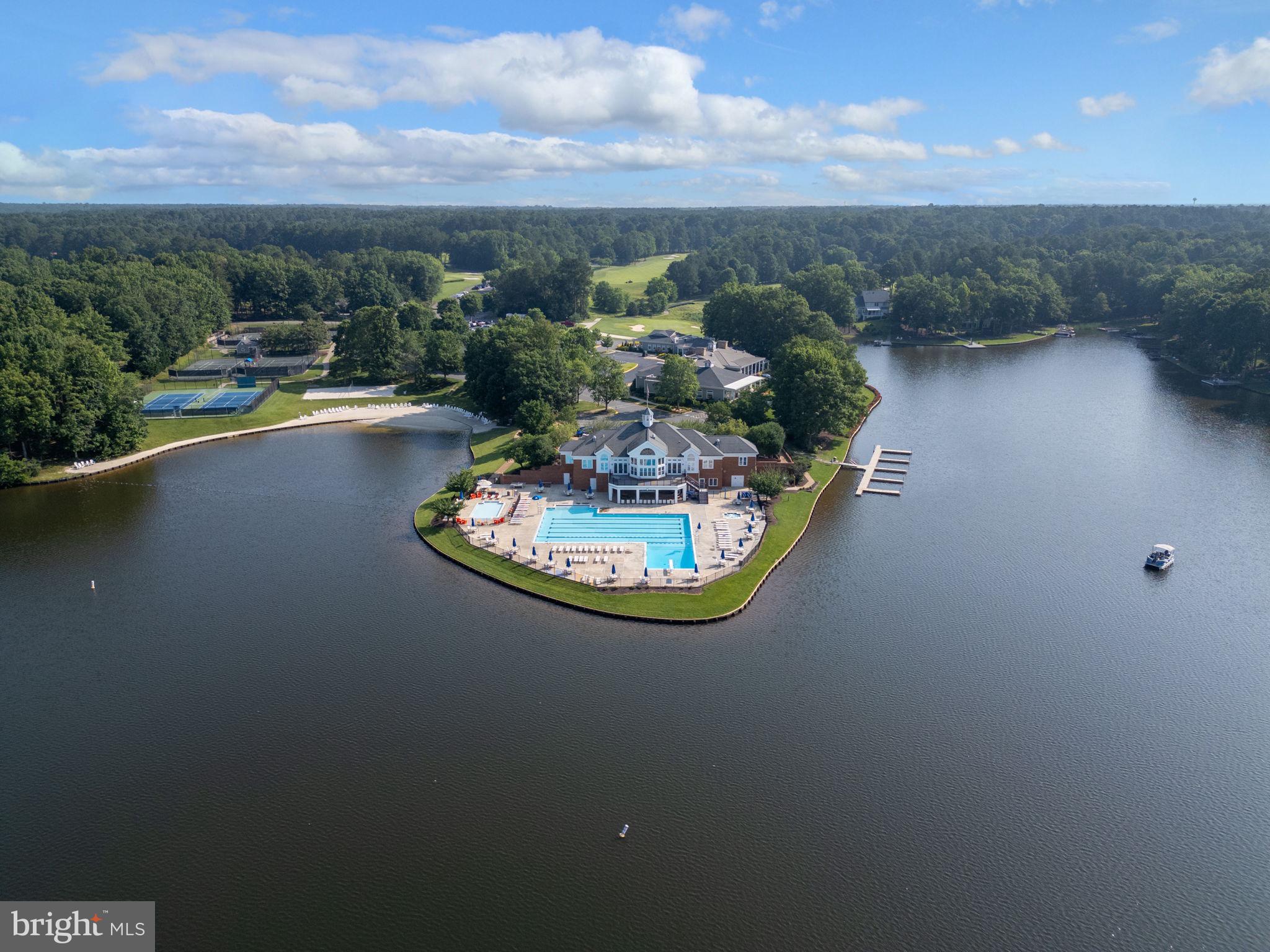 10816 Chatham Ridge Way Spotsylvania, VA 22551 - Photo 89 of 101 a view of a swimming pool with a patio